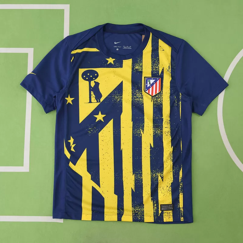 Atlético Madrid temno moder nogometni dres pred tekmo 2025/26