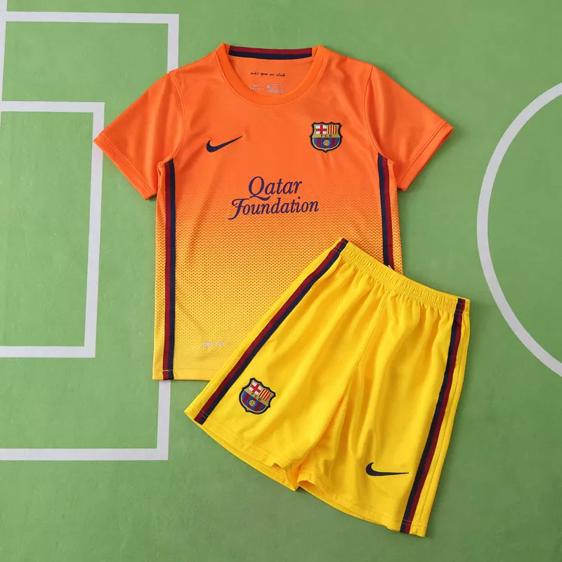 Otroški nogometni dresi Barcelona 12/13 oranžen retro gostujoči komplet